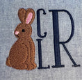 Load image into Gallery viewer, a closeup view of the embroidered rabbit and navy blue monogram