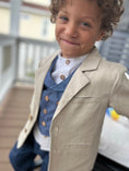 Load image into Gallery viewer, little boy with natural linen sportscoat, blue chambray double breasted waistcoat with wood buttons, white linen button down shirt with poet collar and blue chambray drawstring pants