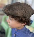Load image into Gallery viewer, side view of boy wearing a light and dark brown tweed newsboy cap