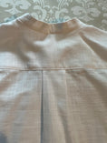 Load image into Gallery viewer, closeup of the back yoke and pleat detail