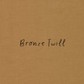 Load image into Gallery viewer, Bronze twill fabric color choice available for the cuffed pleated shorts
