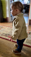 Load image into Gallery viewer, Toddler in profile wearing a tan corduroy sportscoat and jeans
