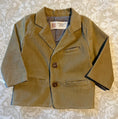 Load image into Gallery viewer, flat lay photo of tan corduroy sportscoat showing details of the lining, wood buttons and welt pockets
